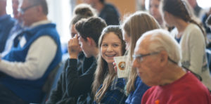 Audience member smiling