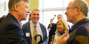 Group photo of sunshare gound breaking with John Hickenlooper