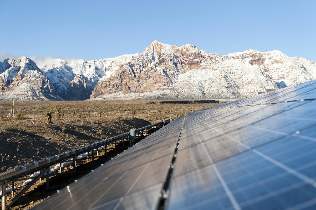 solar panels and snowy mountains