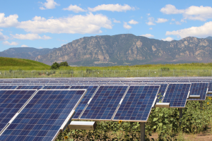 SunShare community solar garden solar panels and mountains